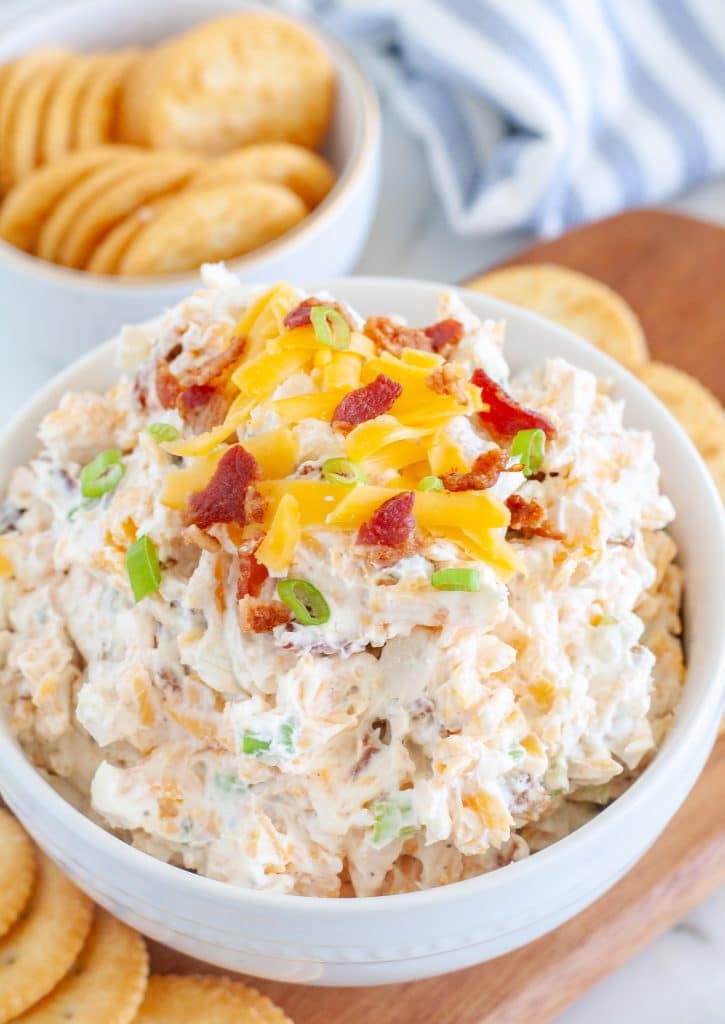 Cream cheese dip in a bowl with crackers